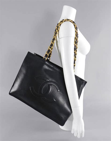 v and a chanel tote bag|Chanel chain tote.